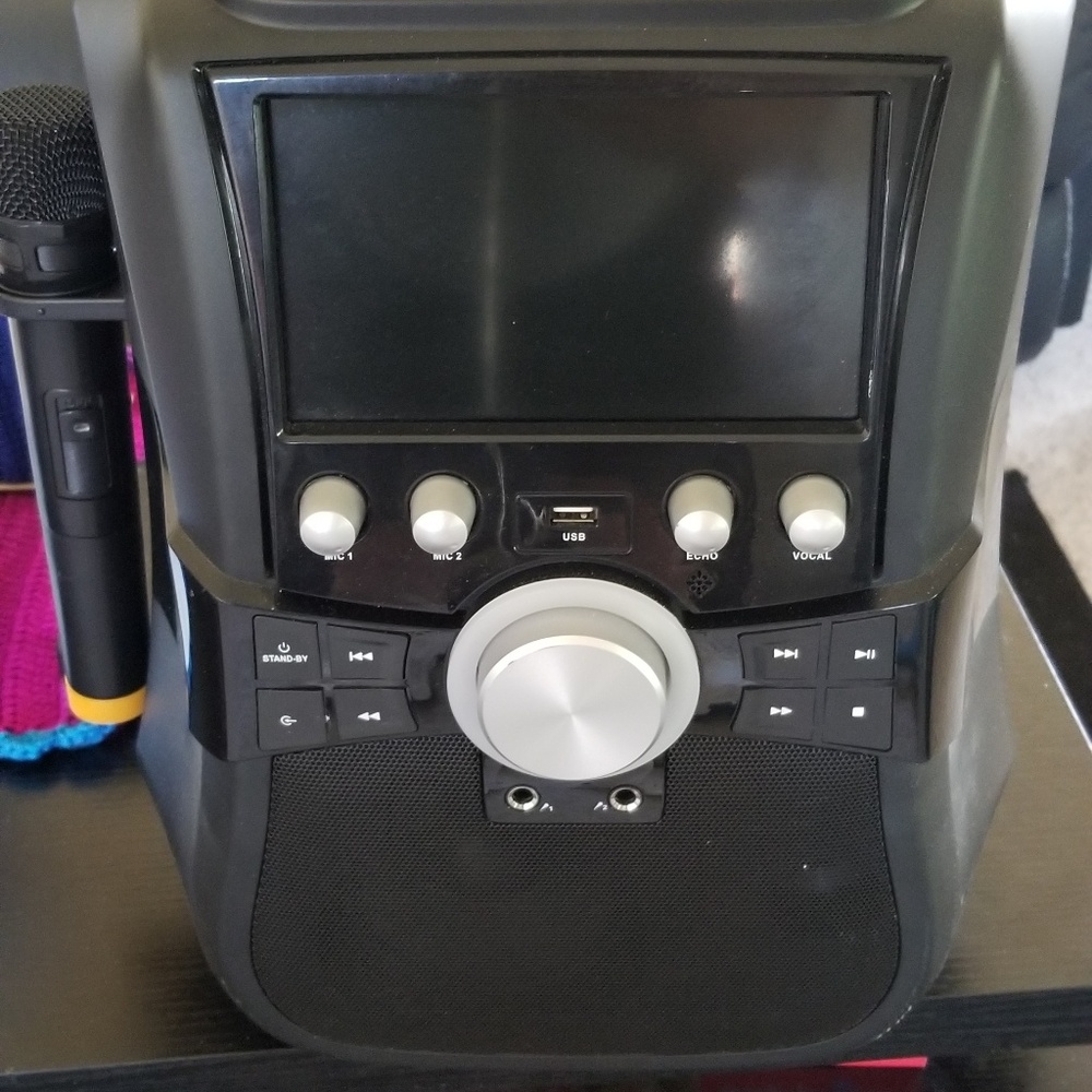 Super sonic portable Karaoke machine and CDs